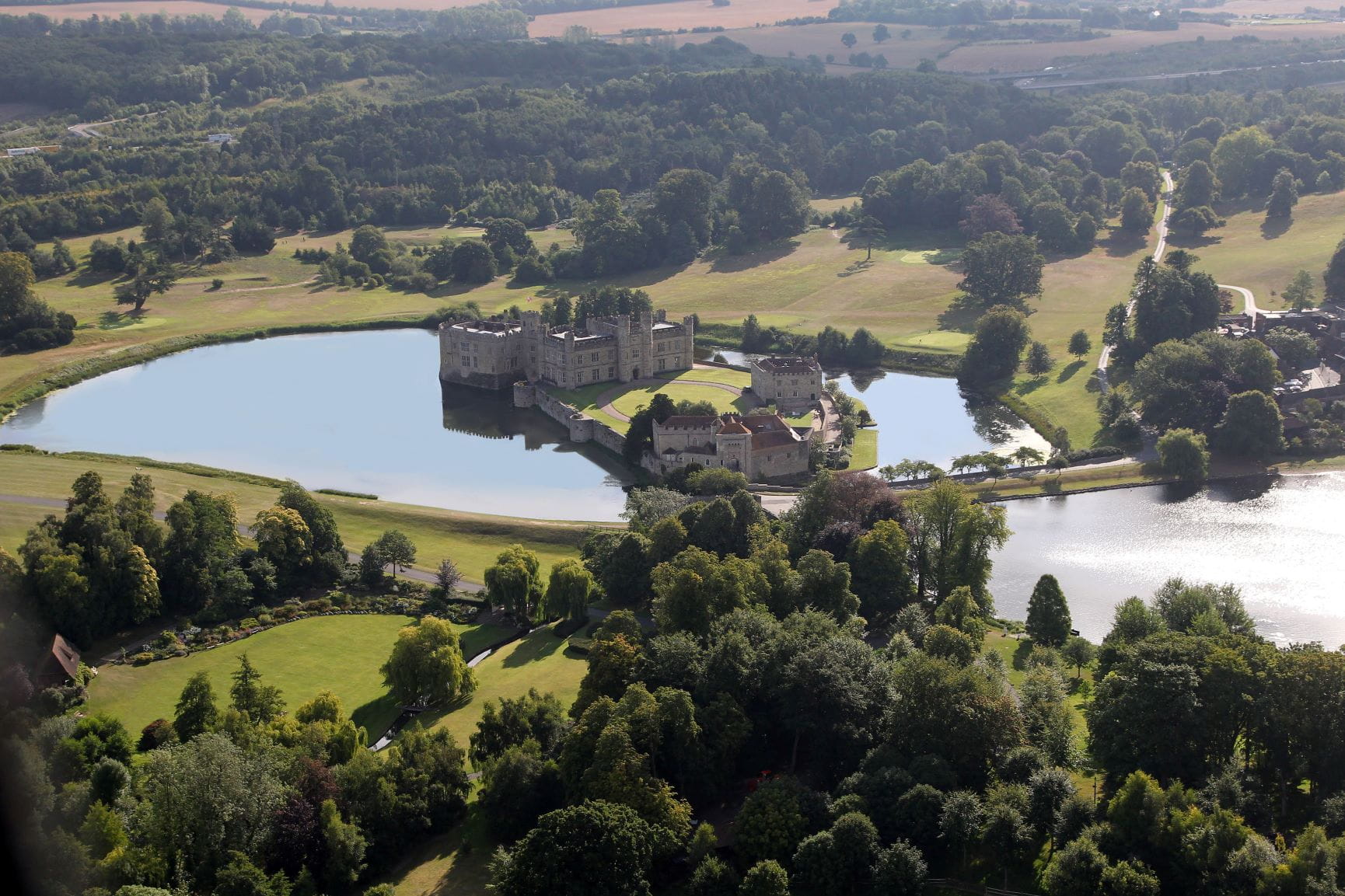 An aerial view of Leeds castle surrounded by a moat