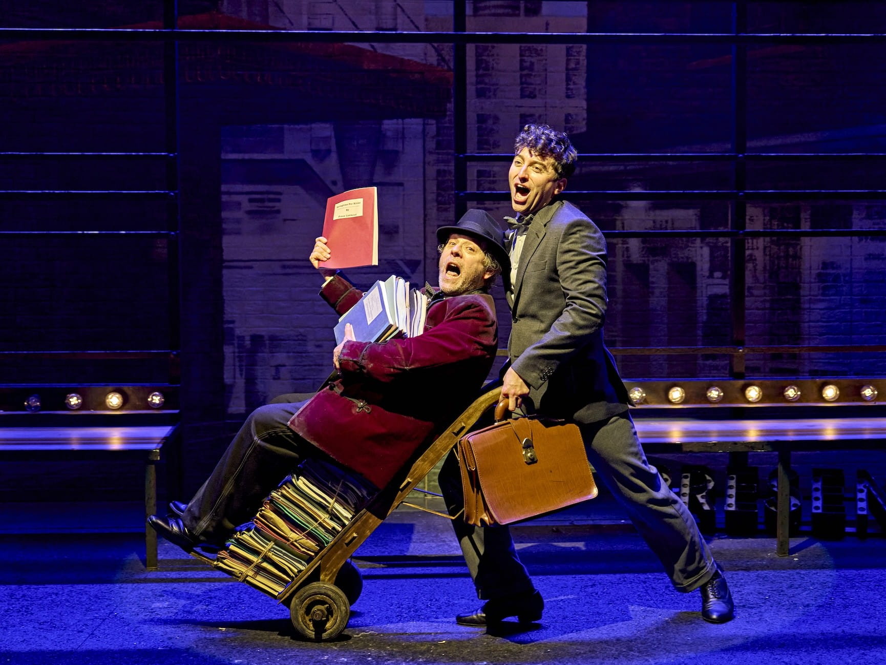 The Producers cast on stage