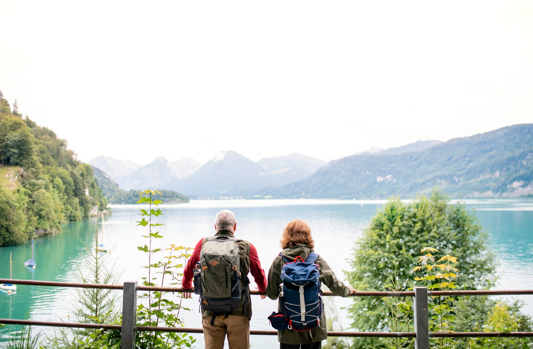 couple looking out to a beautiful lake 