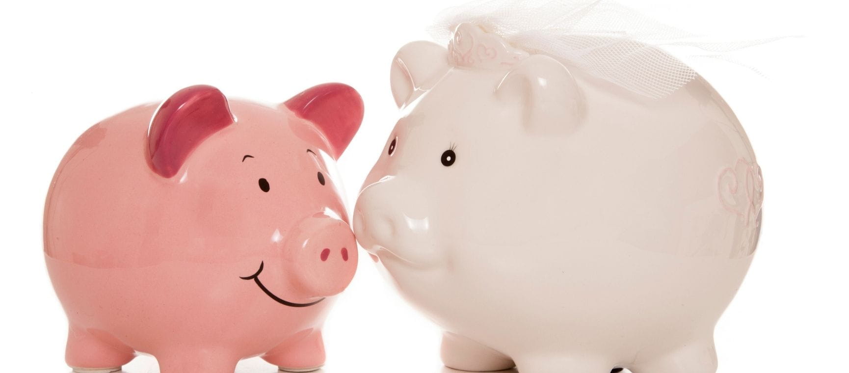 two piggy banks, one with a bridal veil