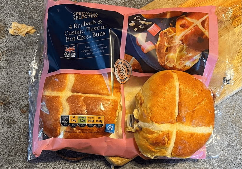 A packet of Aldi rhubarb and custard hot cross buns