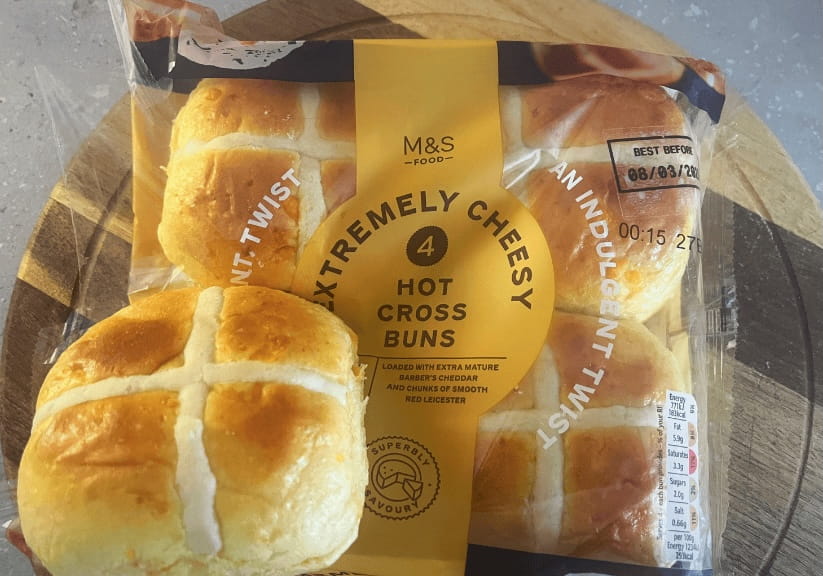 A packet of cheese M&S hot cross buns