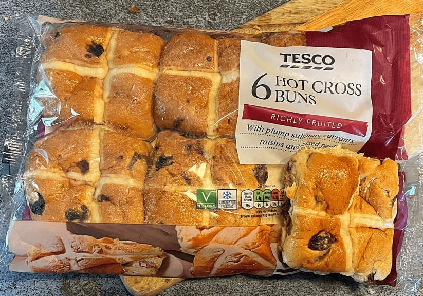 A packet of Tesco Hot Cross Buns