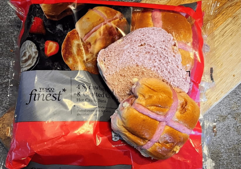 A packet of Tesco strawberry and clotted cream hot cross buns