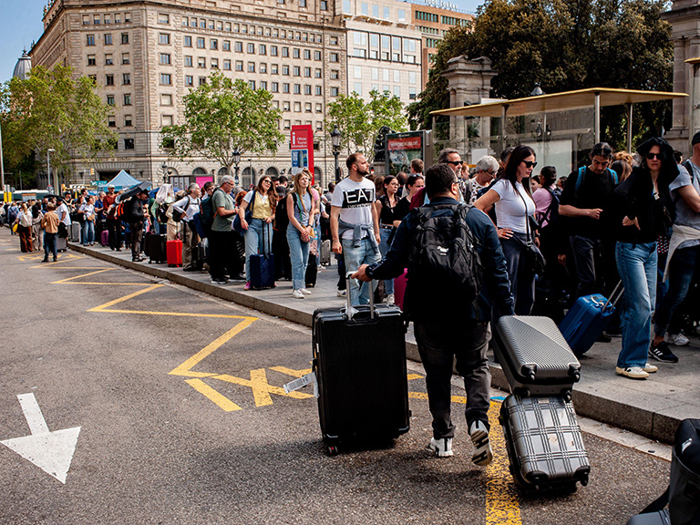 holidaymakers queuing in Spain during the power outage