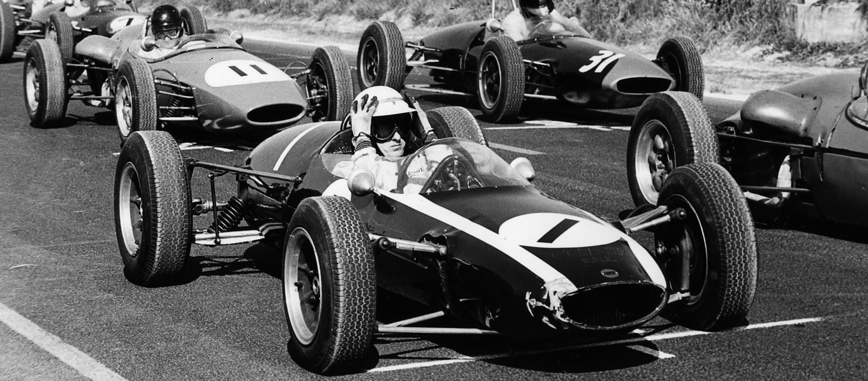 Sir Jackie Stewart at the wheel of a Formula 3 car in 1964