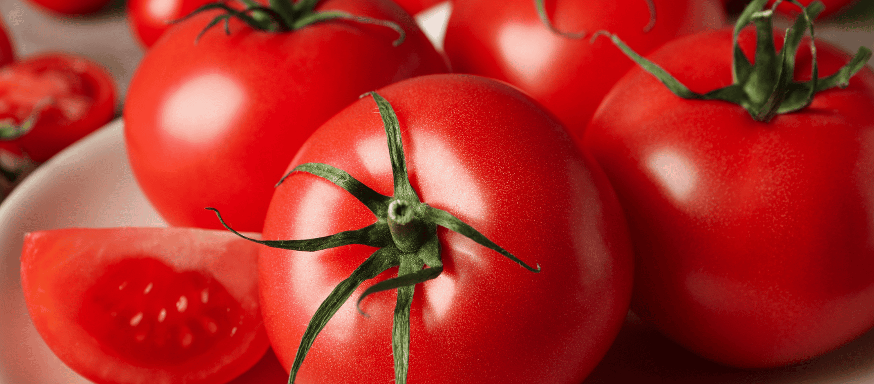 a close up of ripe red tomatoes