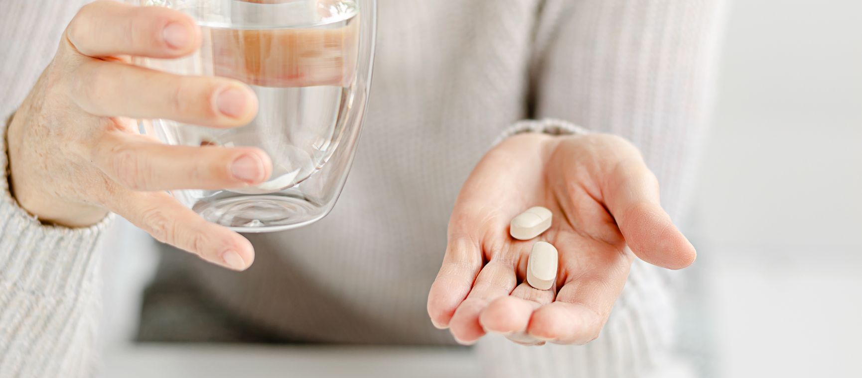 Woman taking vitamins