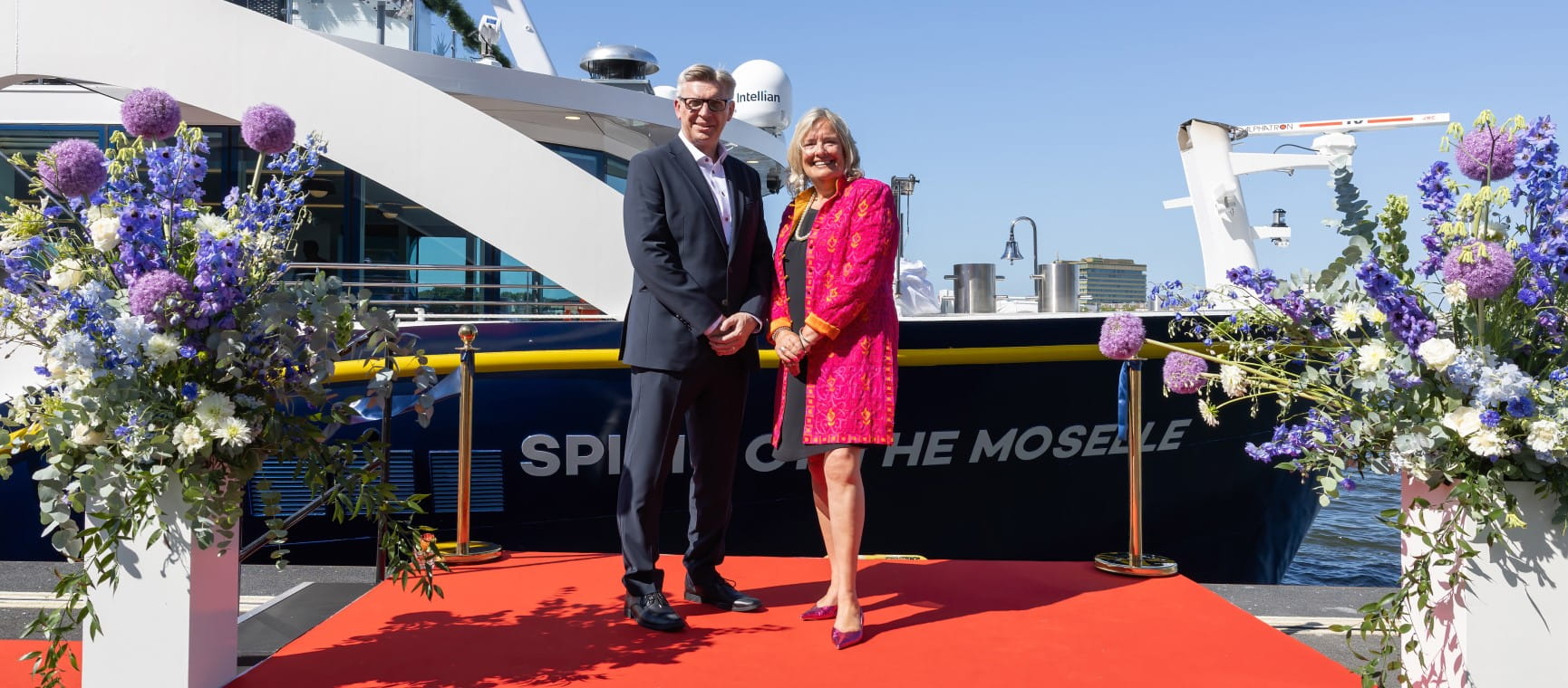 Louise Robinson with Nigel Blanks at the naming ceremony, in front of the Spirit of the Moselle