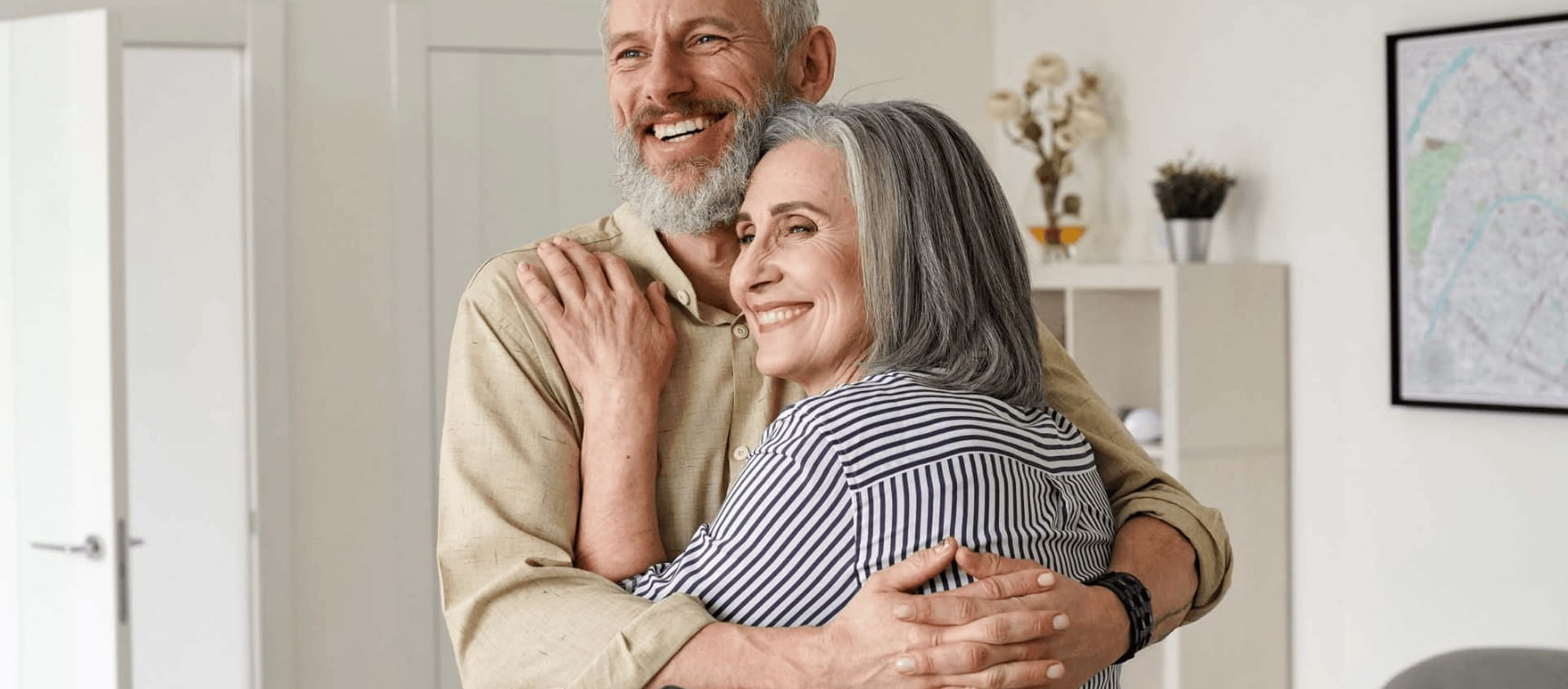 a couple hugging and smiling