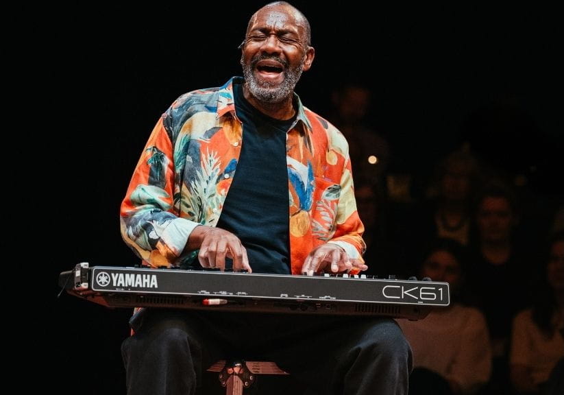 Lenny Henry playing a keyboard in Every Brilliant Thing