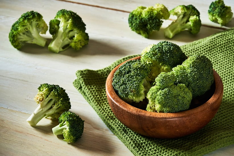 Broccoli florets in a small dish