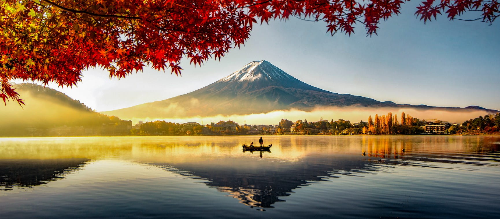 Fuji Mountain and Fisherman Boat with Morning Mist in Autumn, Kawaguchiko Lake, Japan