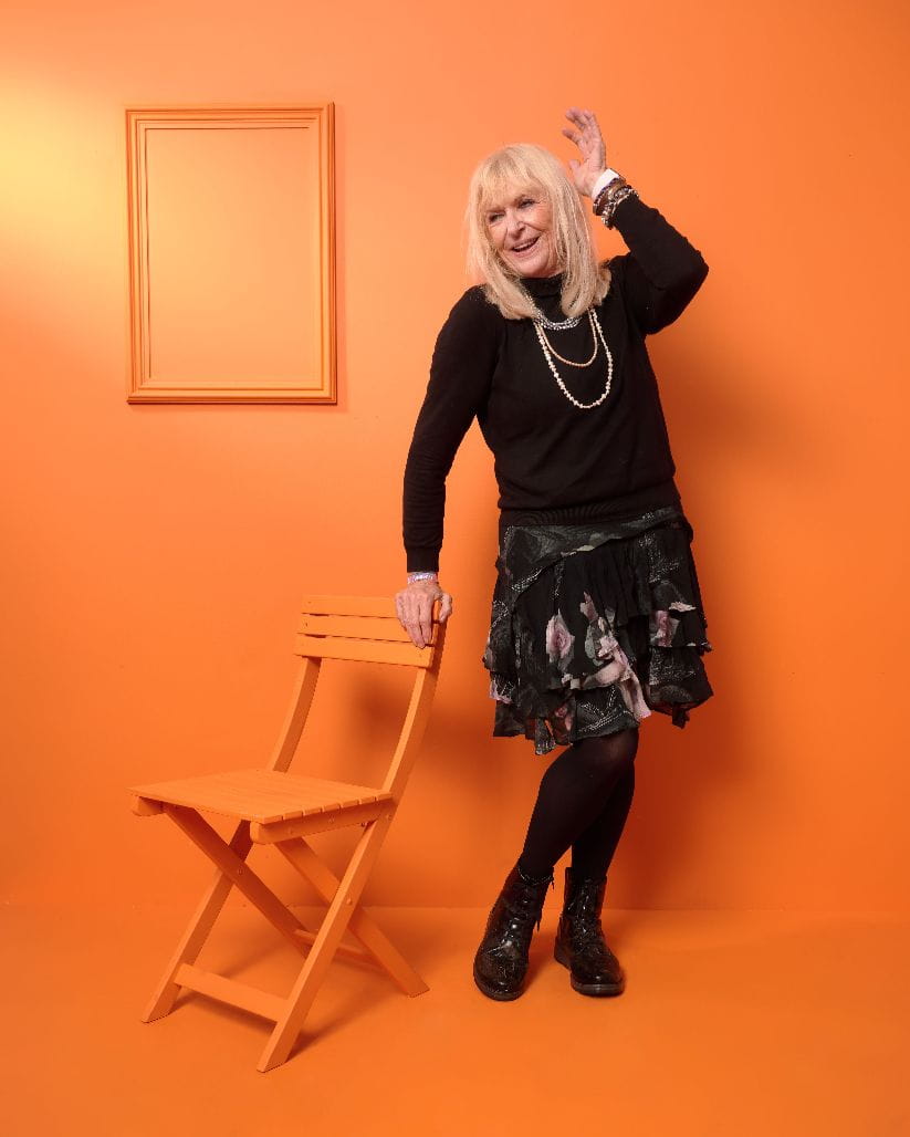 Sally Traffic posing with a chair