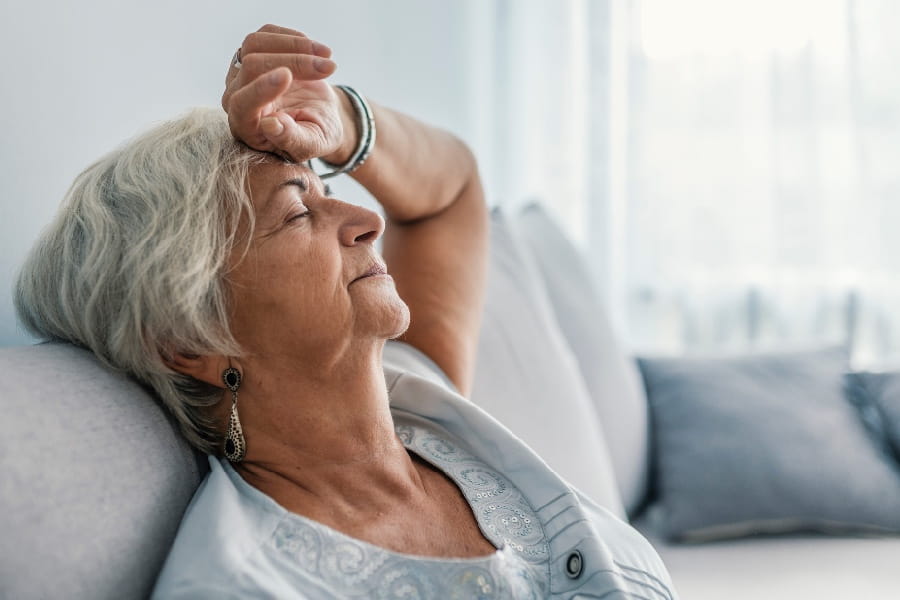 Woman asleep on the sofa