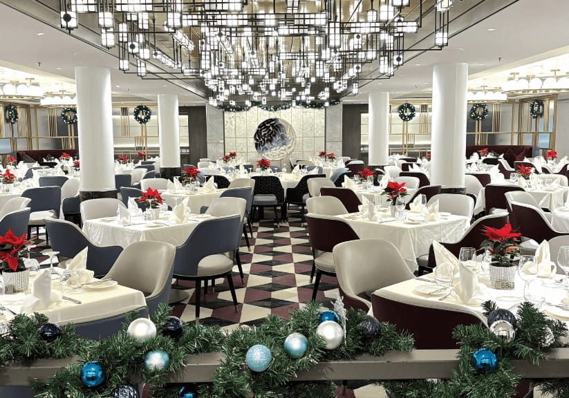 The dinning room on the cruise ship all set up for Christmas