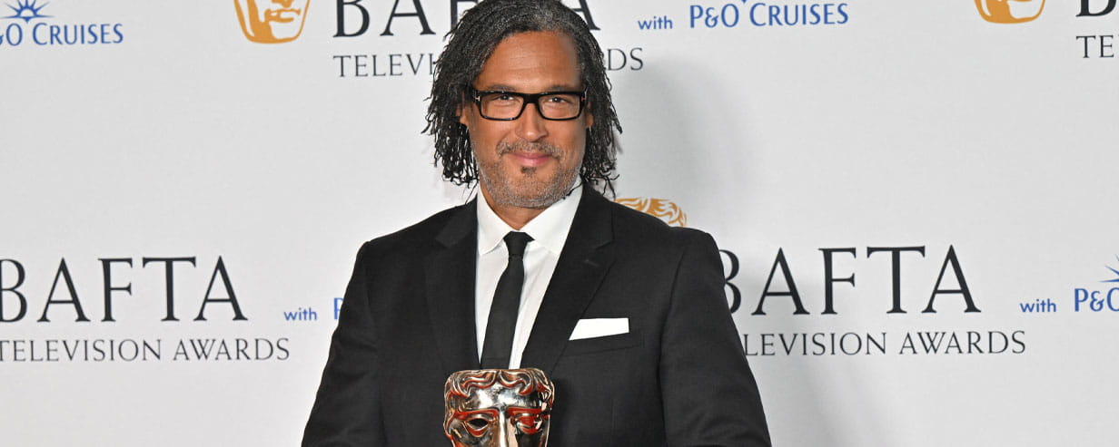 David Olusoga with hisvBafta award for 2016’s Britain’s Forgotten Slave Owners