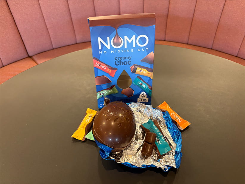 The NOMO Easter egg displayed with its packaging
