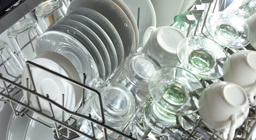 Dishwasher full of clean dishes as seen from above