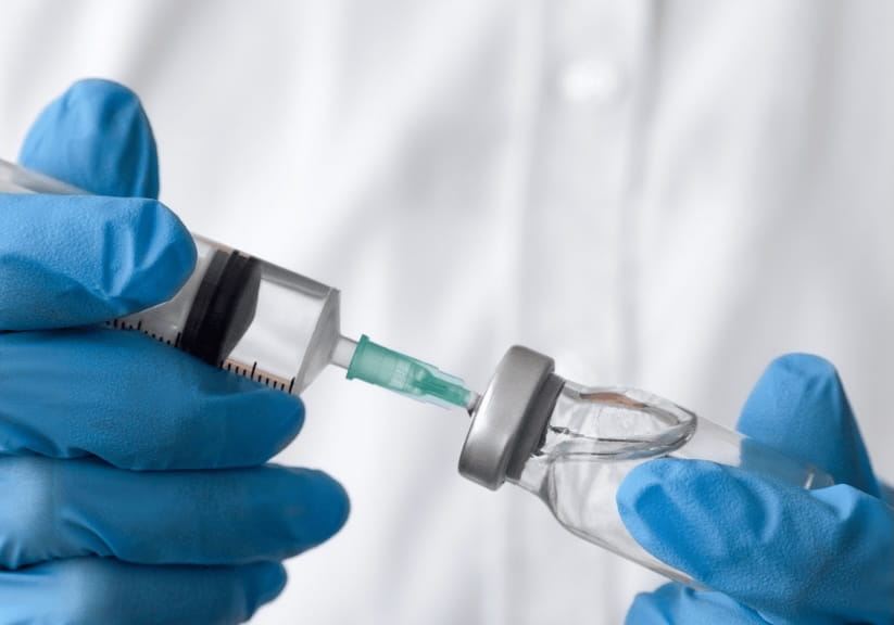 A close up of a vaccination injection