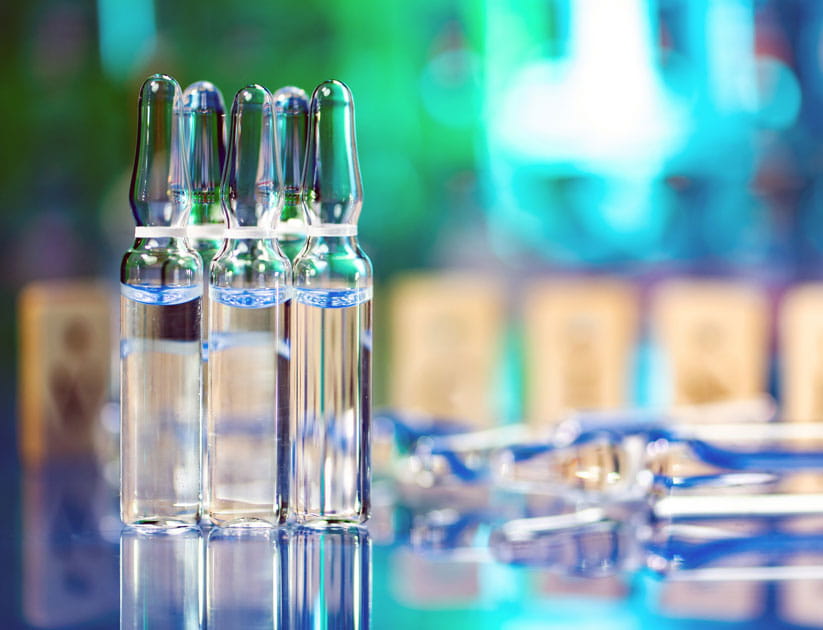 Close up shot of vaccine glass ampoules in a laboratory