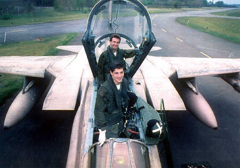John Nichol standing in the cockpit of an RAF Tornado
