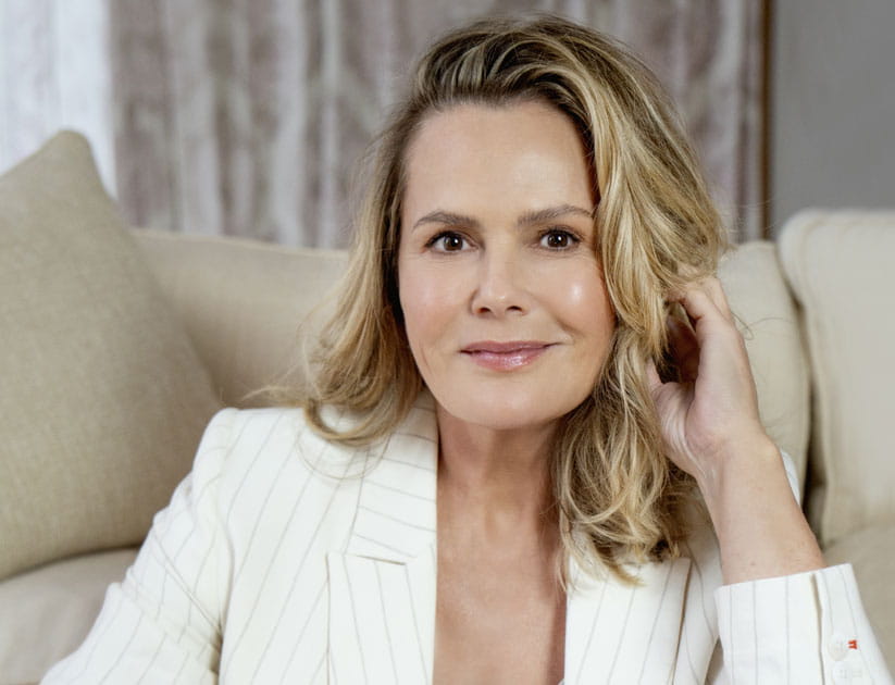 Head and shoulders of Liz Earle wearing a light suit and facing the camera