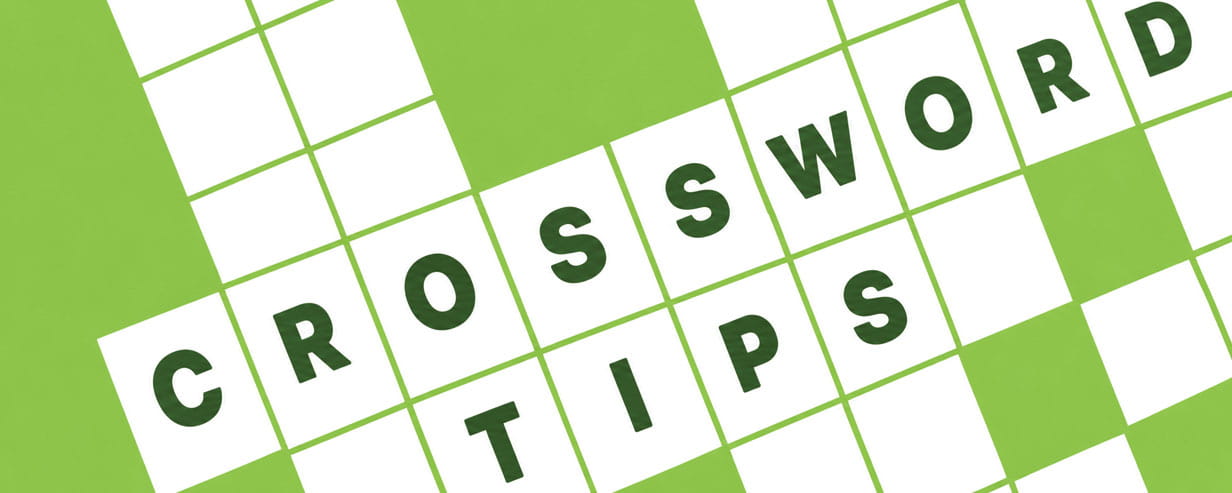 A green background with white blocks, some of which are filled in. Text reads: Crossword tips for beginners