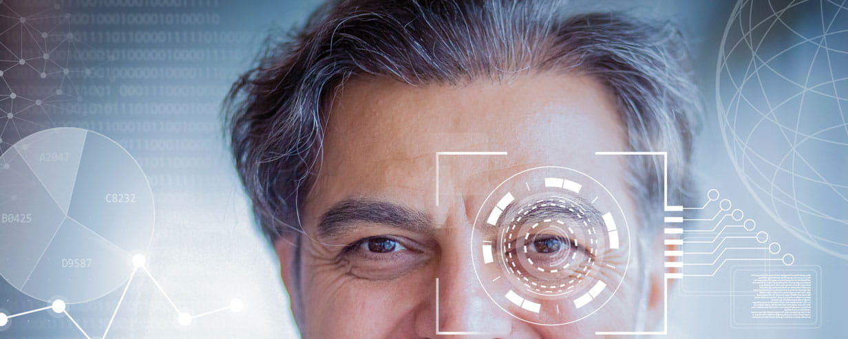 Closeup portrait of mature man looking at camera with health stats and a camera focus superimposed over his eyes