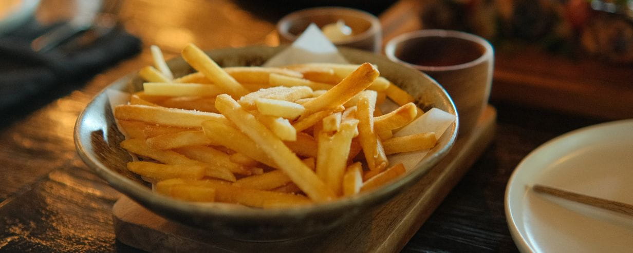A bowl of straight cut chips