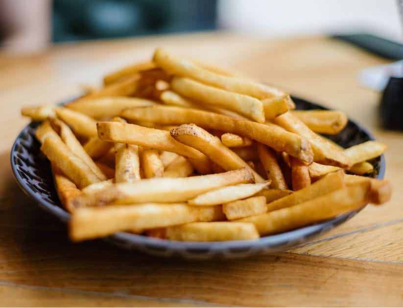 A bowl of thin straight cut chips