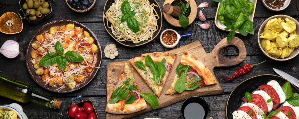 A massive dinner table with a combination of different foods