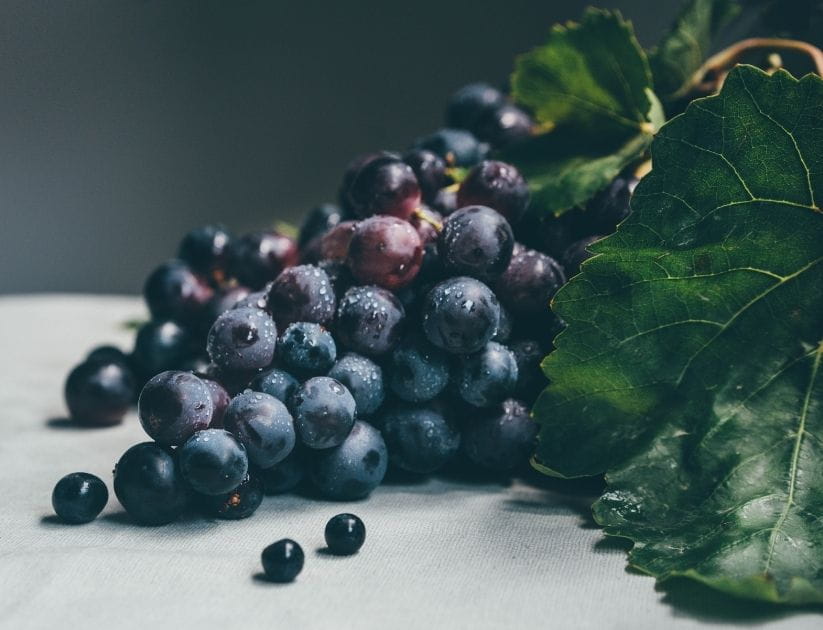 A bunch if grapes on a counter