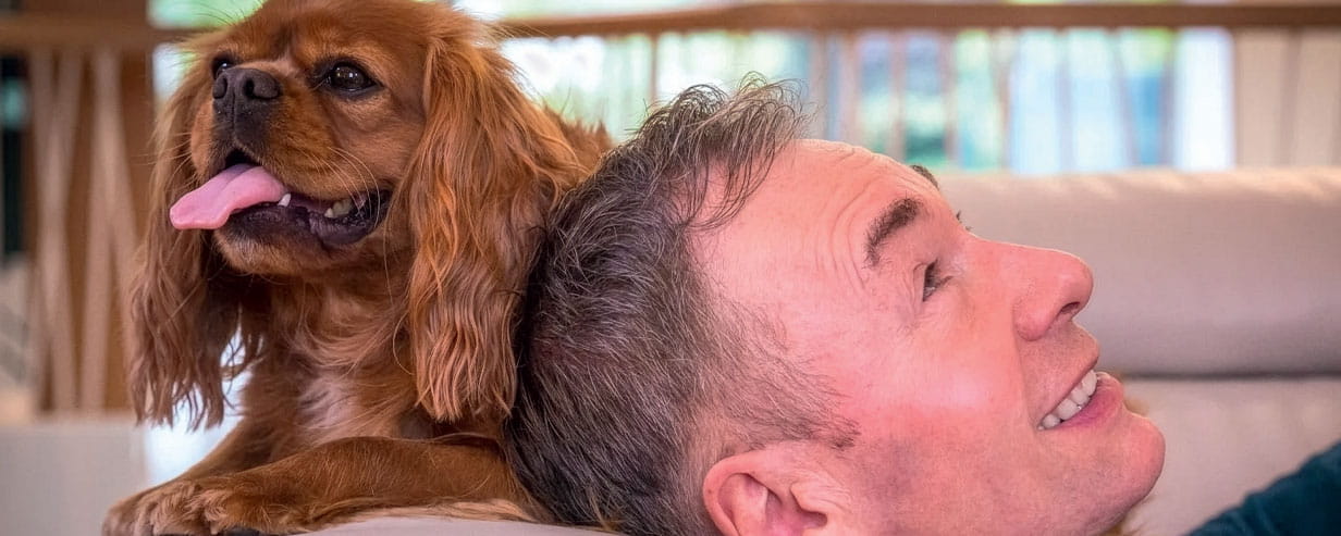 Tony Parson's with his dog lying next to his head