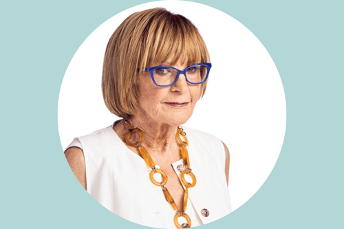 Head and shoulders of Anne Robinson with a light blue background