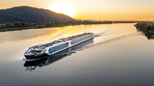 A Saga river cruise ship at sunset