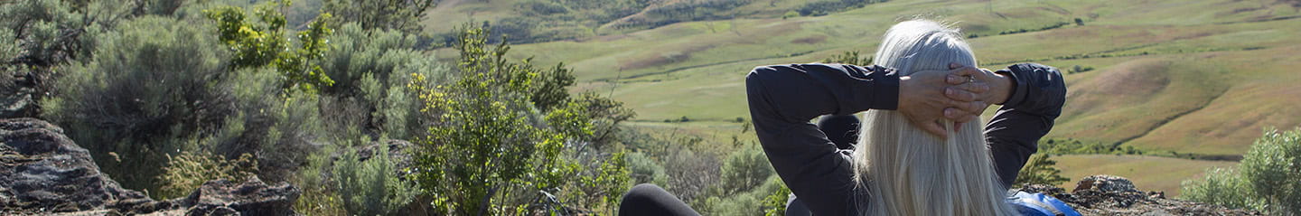 A hiker relaxing and taking in the view