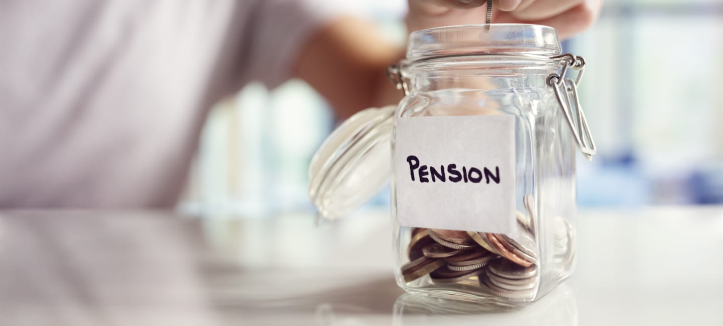 A person putting coins in a jar labelled 'Pension'