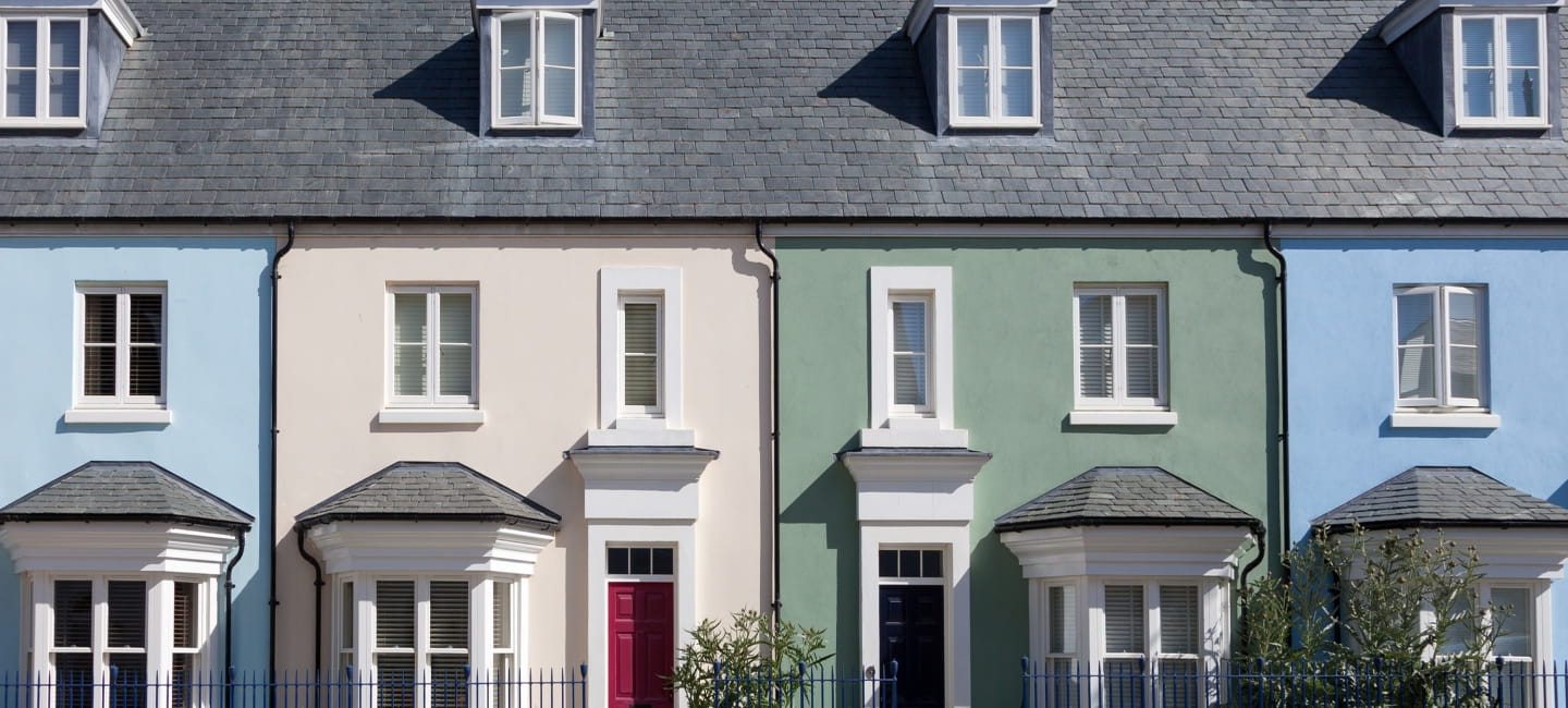 A row of colourful terrace houses