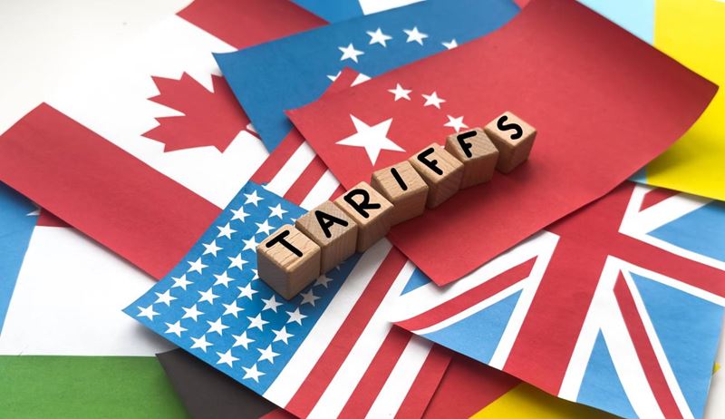 Import Trade Tariffs increase concept with United States of America Flag. Trade wars