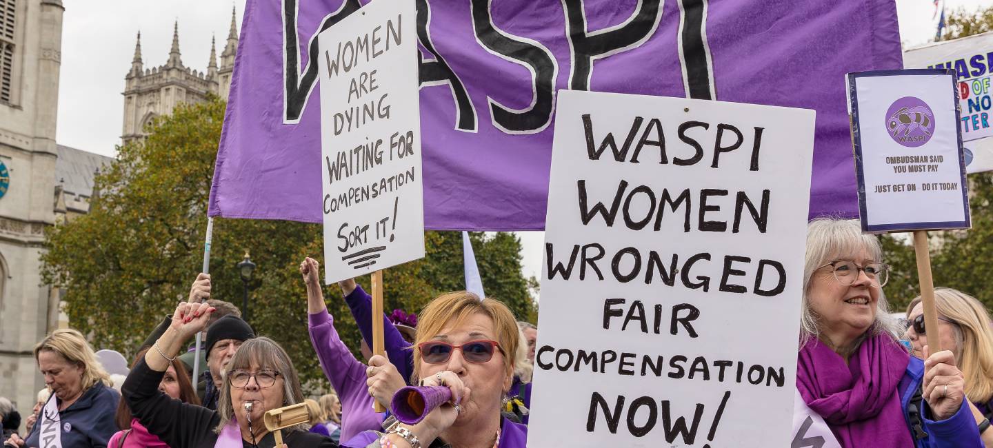 WASPI women demonstrating on Budget Day outside the Houses of Parliament, about the lack of compensation not being paid to them as outlined by the Ombudsman