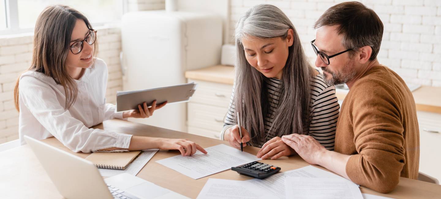 Family couple, discussing mortgages, at home