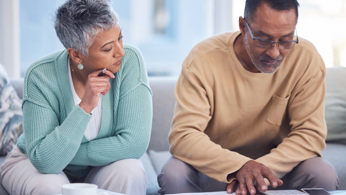 Finance, insurance and senior couple with documents, planning tax and home budget with a laptop. Ecommerce, strategy and elderly man and woman banking during retirement online with pension savings
