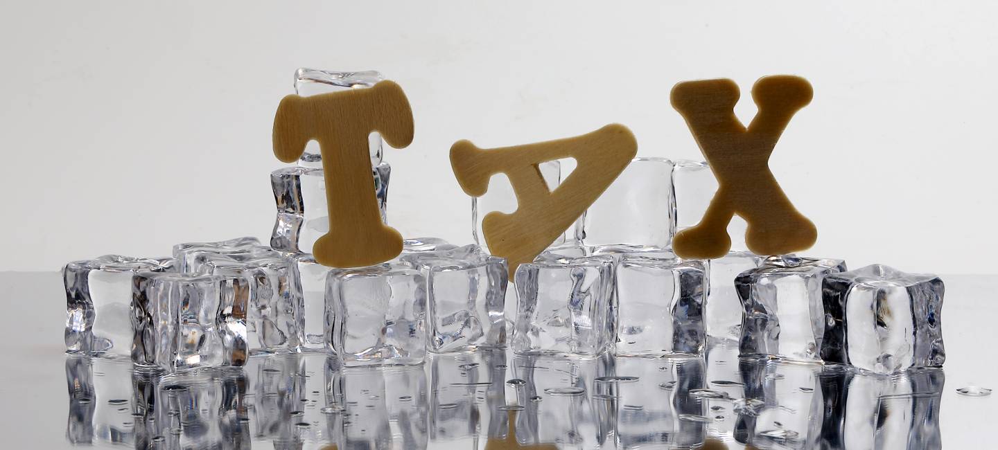 Tax alphabet ice cube freeze cool on white background