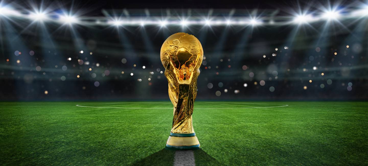 FIFA World Cup in an epic stadium. soccer field in the evening light - center, midfield.
