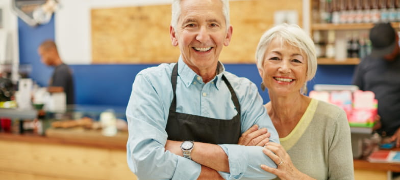 A smiley couple in a coffee shop
