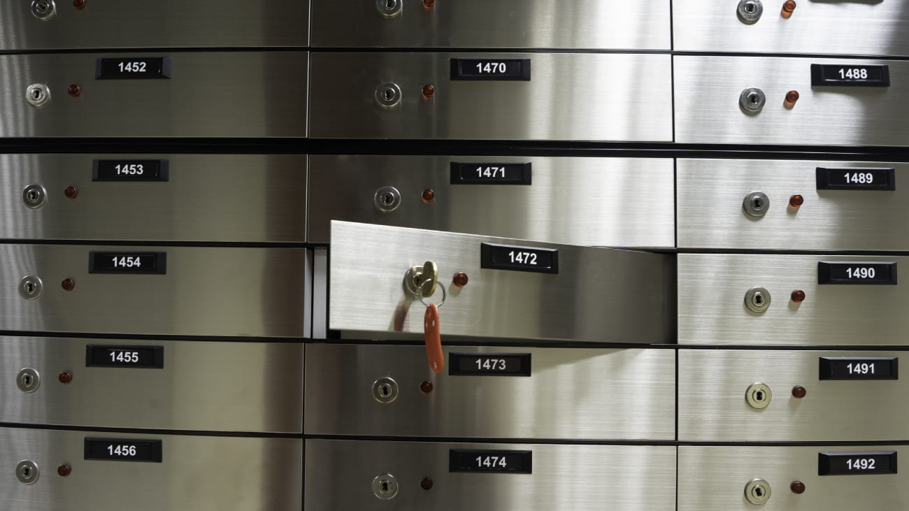 Lots of small lockers. The central locker is open and has a key in the lock. 