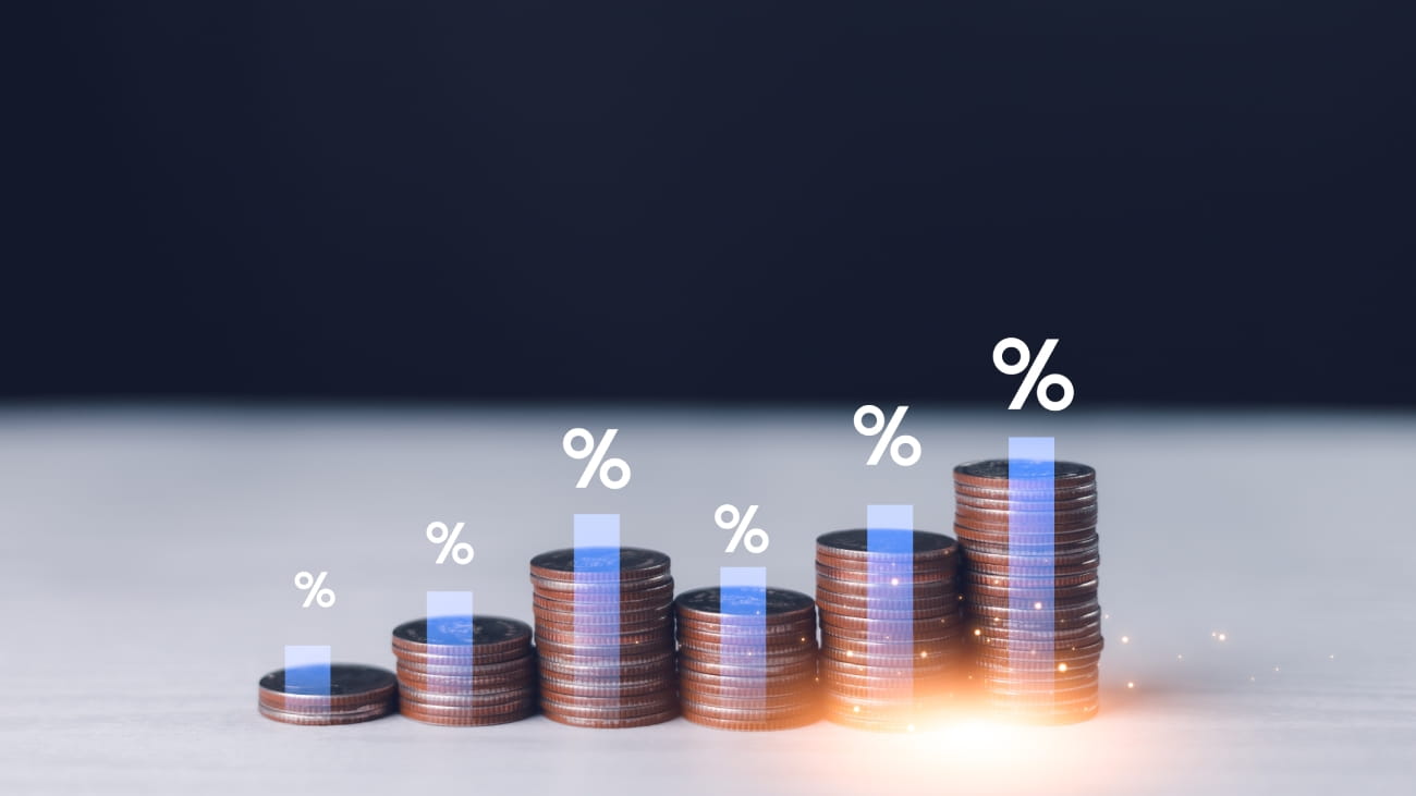 Interest rate and dividend concept, Businessman is calculating income and return on investment in percentage. income, return, retirement, compensation fund, investment, dividend tax, stock market.