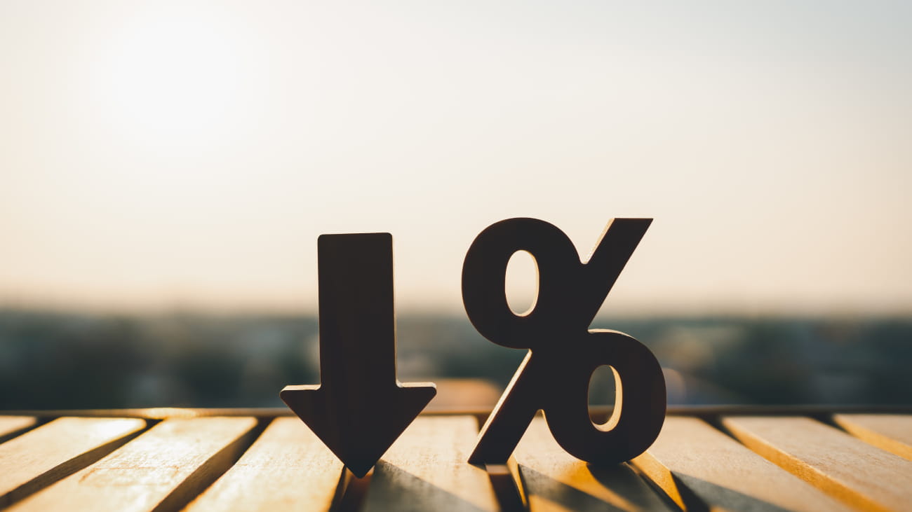 Percentage model and down arrow with evening sky Key concepts for success, methods, systems of raising or lowering Fed interest rates to correct inflation concepts.