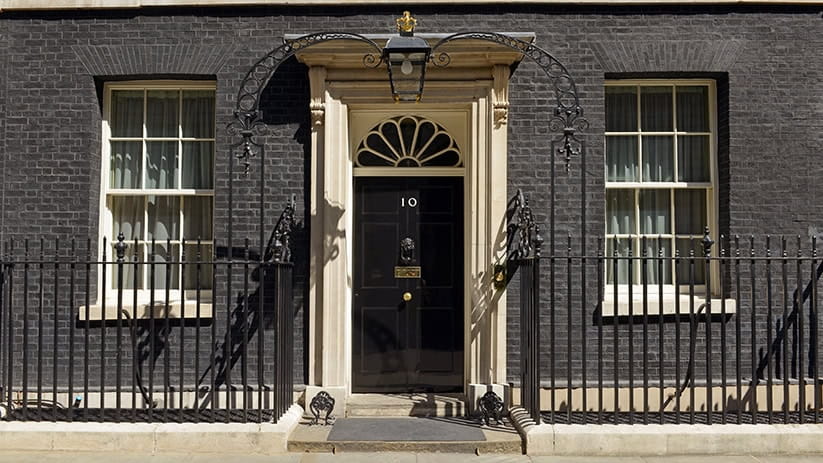 Exterior shot of Number 10 Downing Street on a sunny afternoon